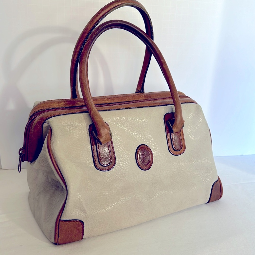 Pebbled leather vintage doctors bag in bone and brown leather..